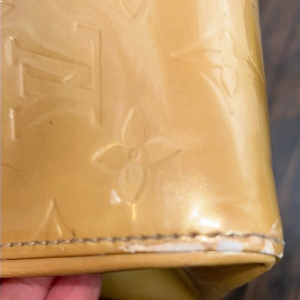 LOUIS VUITTON Gold Tote with Iconic Embossed Design